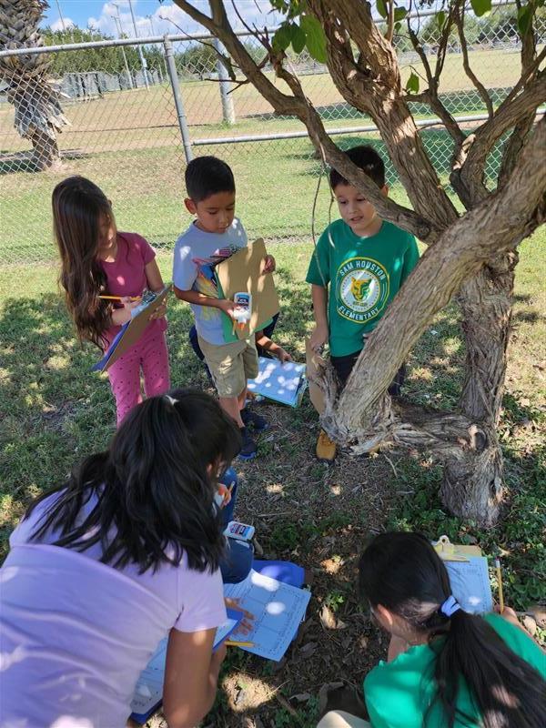 Students completing scavenger hunt activity.