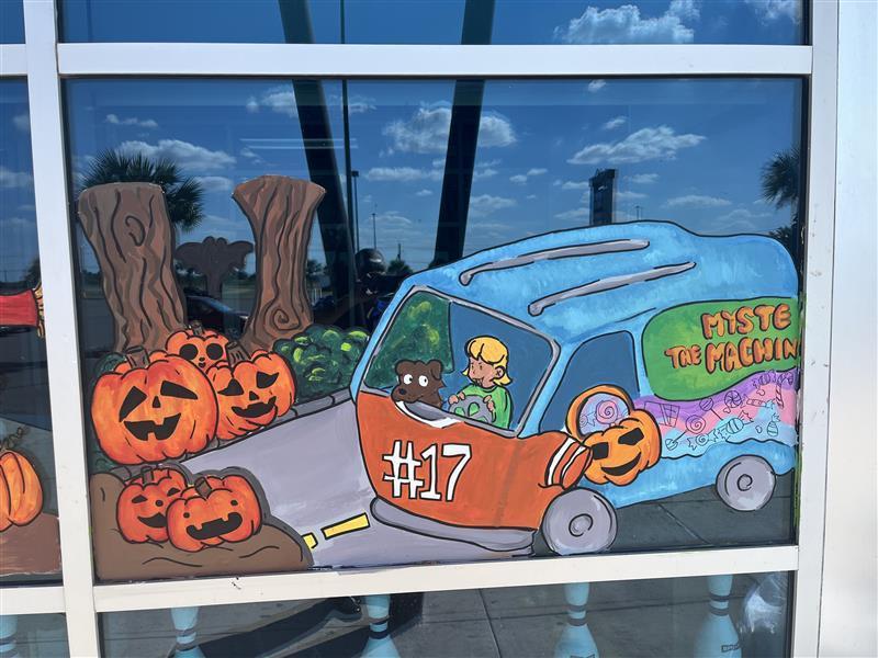 scooby doo art work painted on main event window