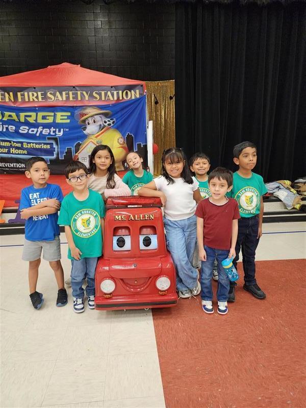 Kids posing during fire safety week.