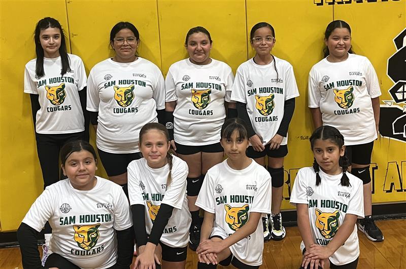 Volleyball team posing.