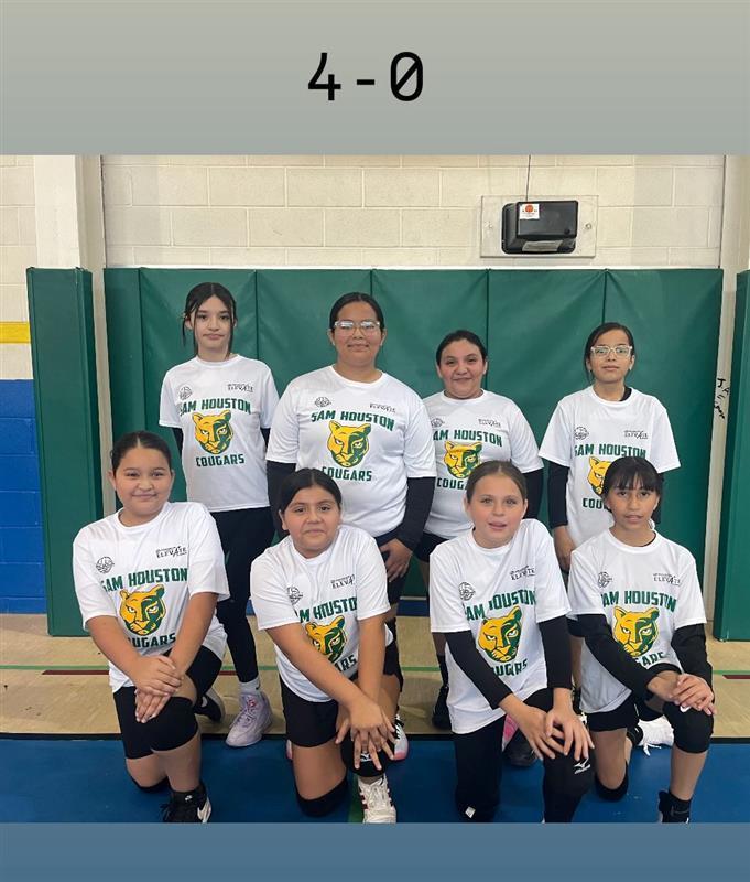 Volleyball team posing.