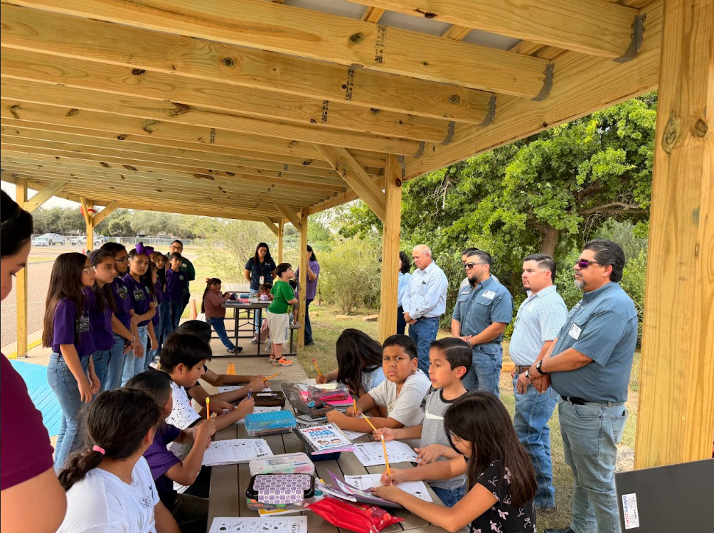 Students engaged in a lesson at the Learning Canopy.