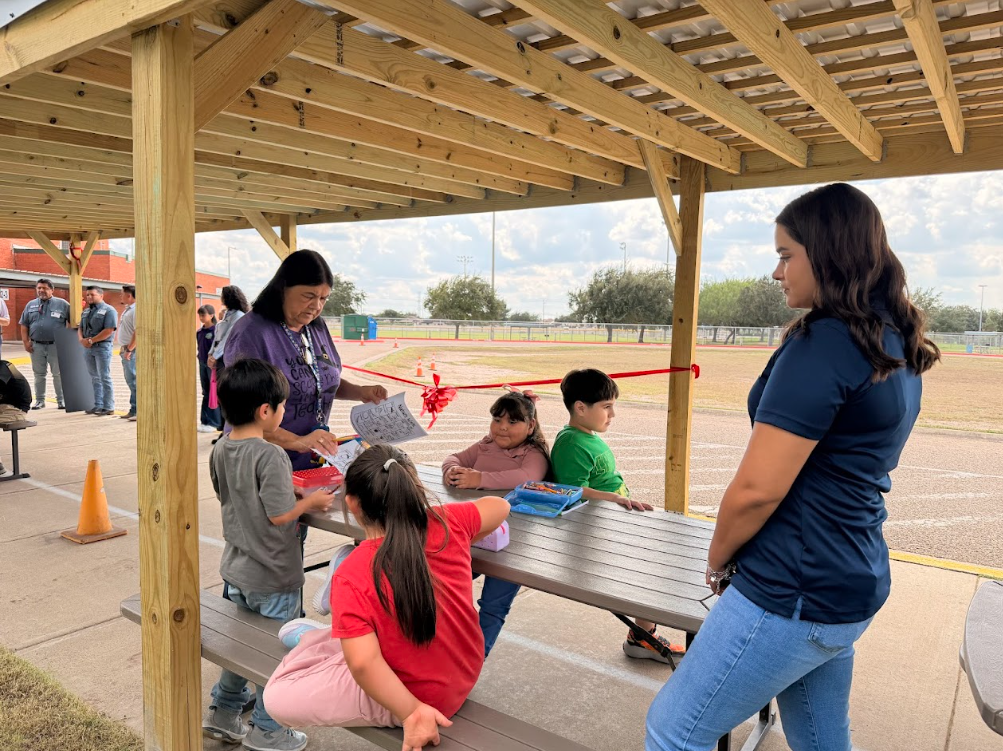 Students engaged in a lesson at the Learning Canopy.