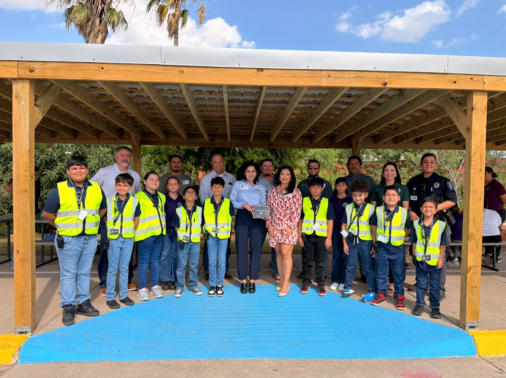 Houstonville Safety Officers posing at ribbon cutting ceremony.