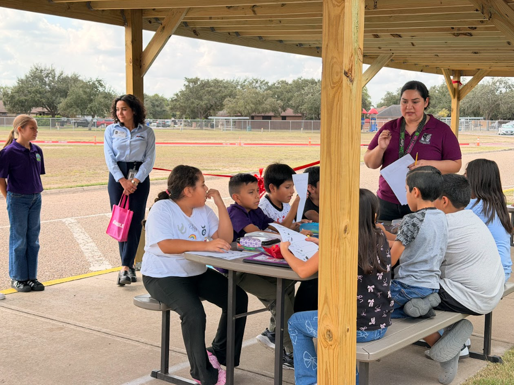 Students engaged in a lesson at the Learning Canopy.