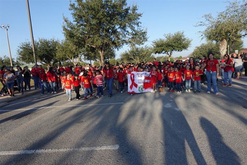 Kids marching in parade.