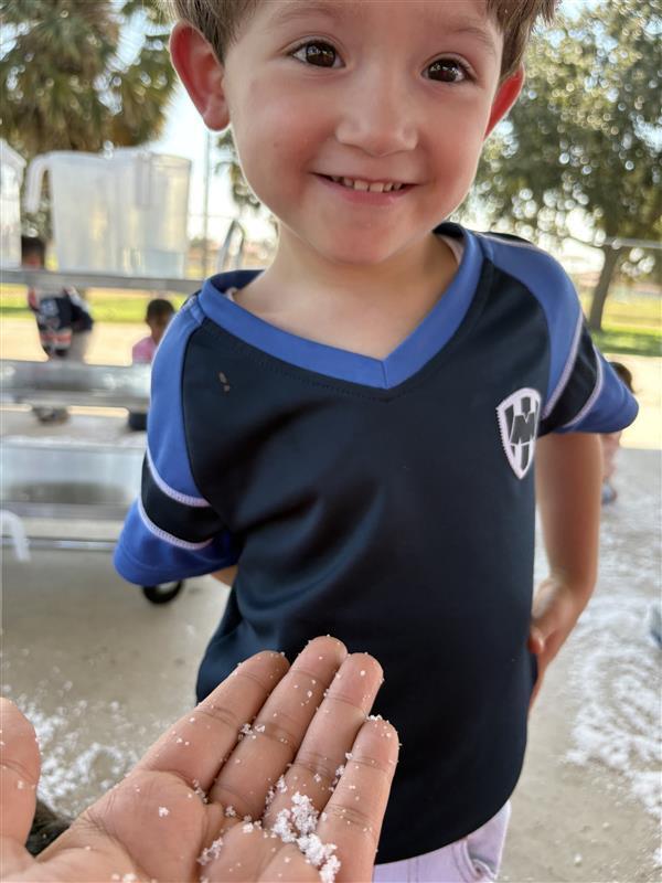 Student happy about seeing snow.