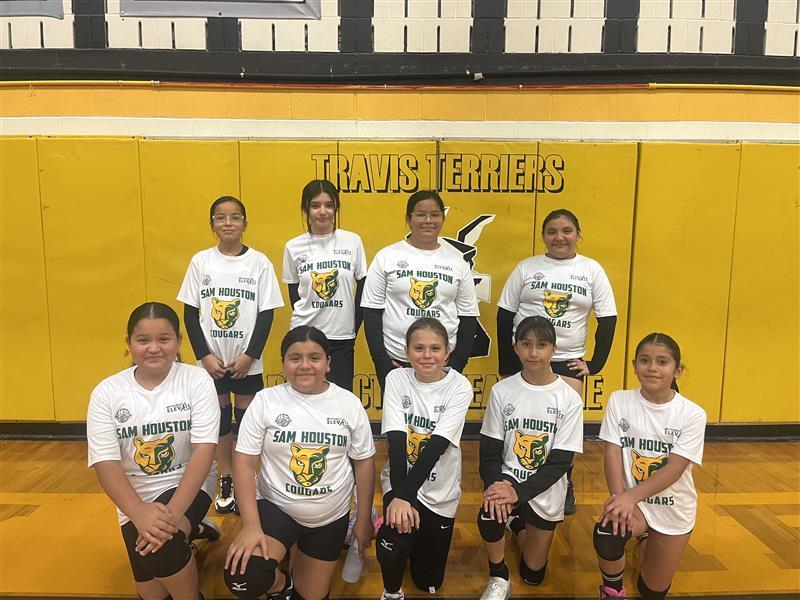 Volleyball team posing.