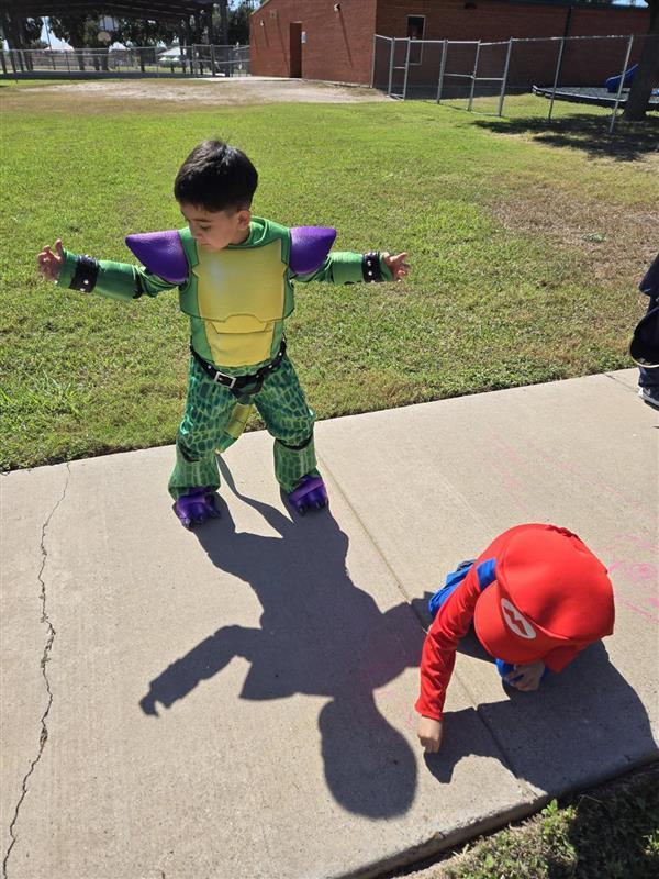 Students participating in tracing shadows activity.