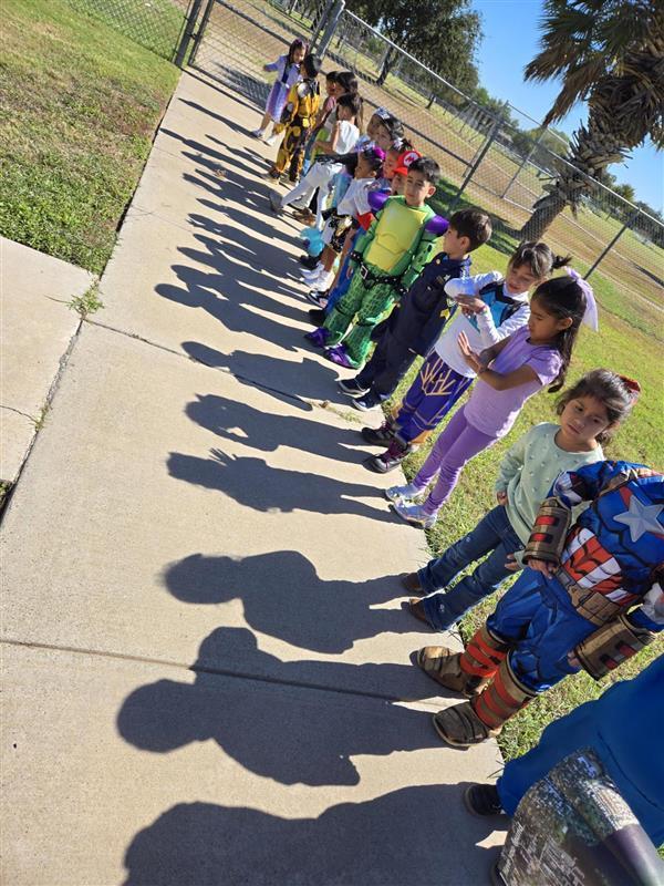 Students participating in tracing shadows activity.