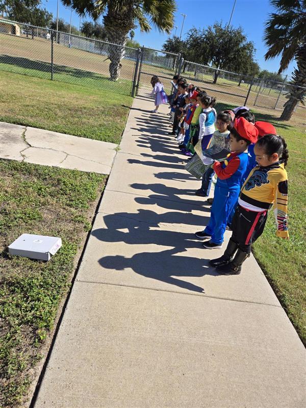Students participating in tracing shadows activity.