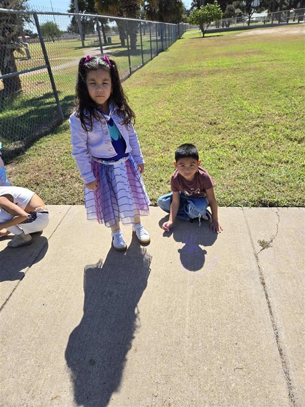 Students participating in tracing shadows activity.