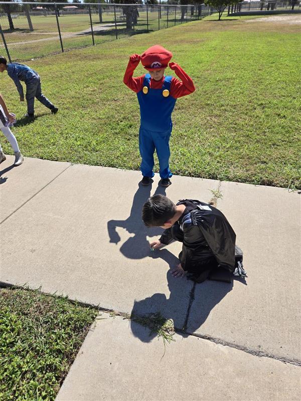Students participating in tracing shadows activity.
