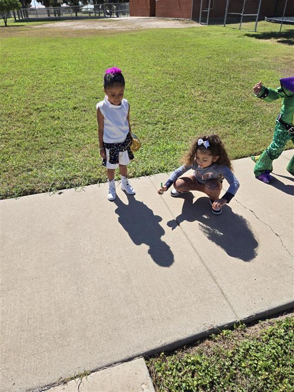 Students participating in tracing shadows activity.