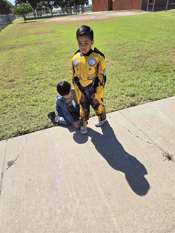 Students participating in tracing shadows activity.