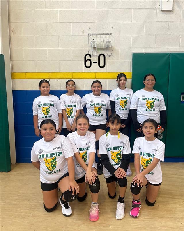 Volleyball team posing.