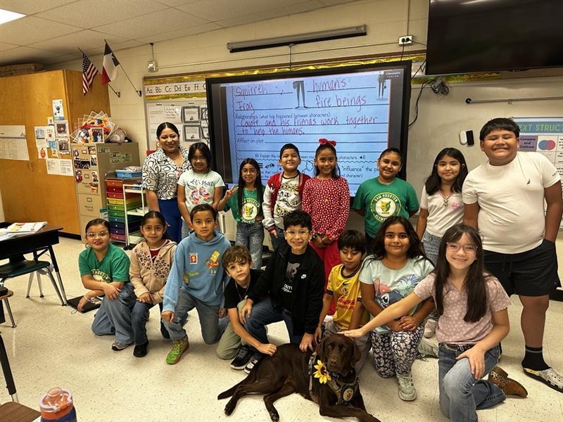 Students posing with K9.