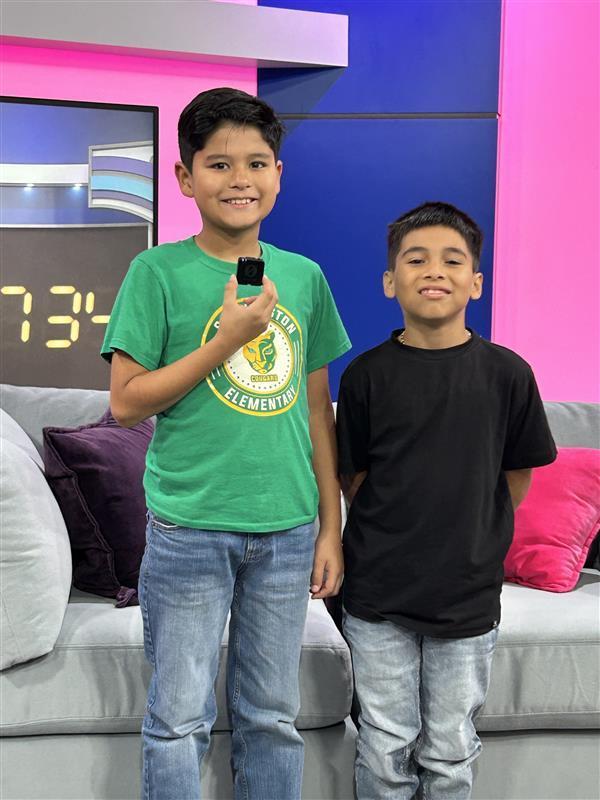 Students posing at KRGV Newsroom.