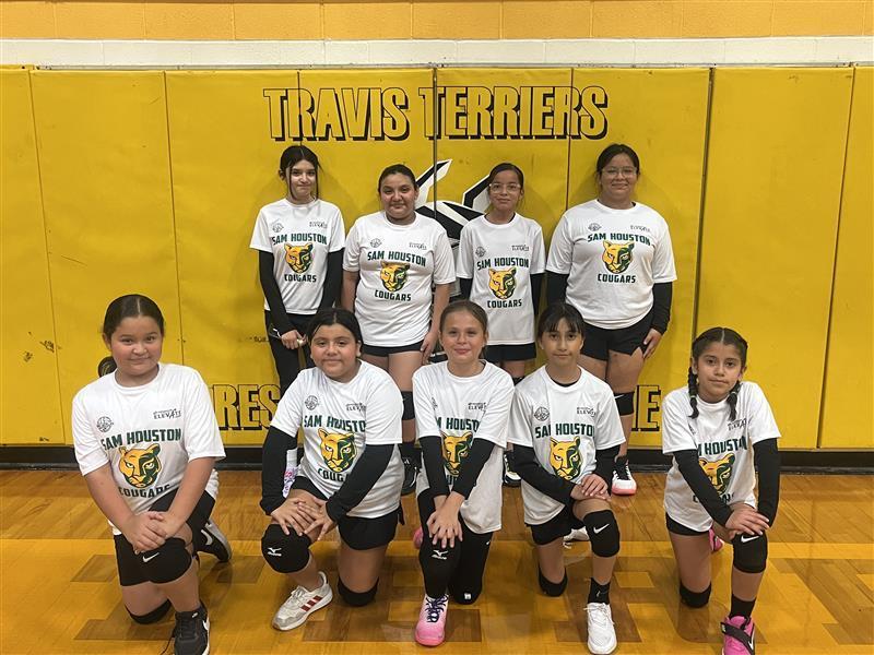 Volleyball team posing.