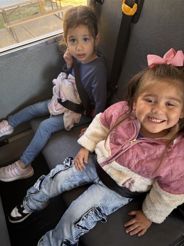 Kids posing during bus safety training.
