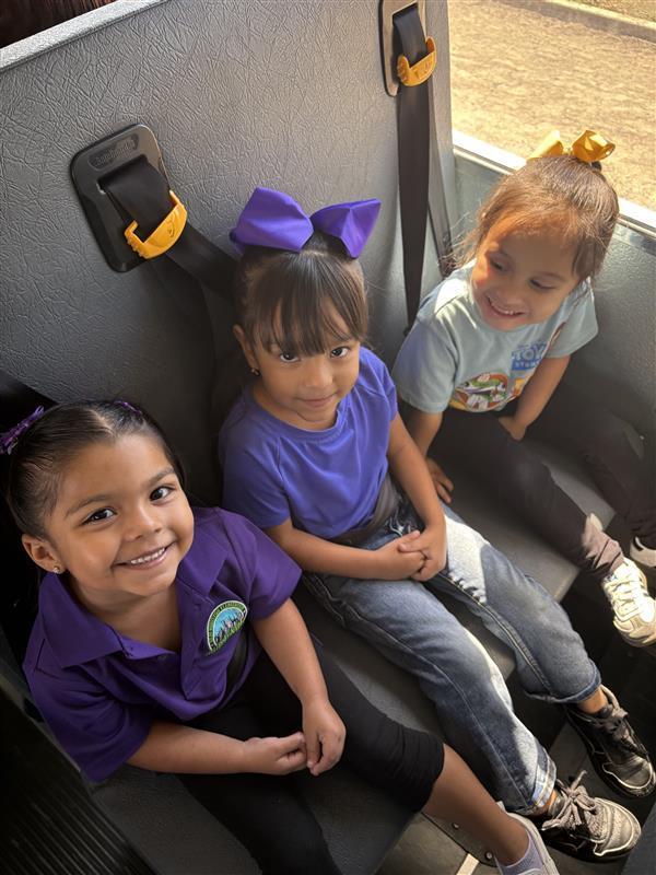Kids posing during bus safety training.
