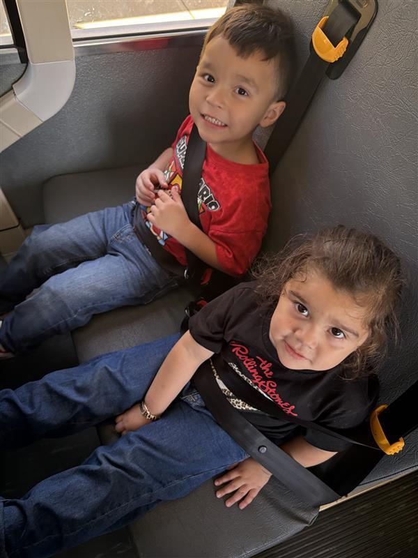 Kids posing during bus safety training.