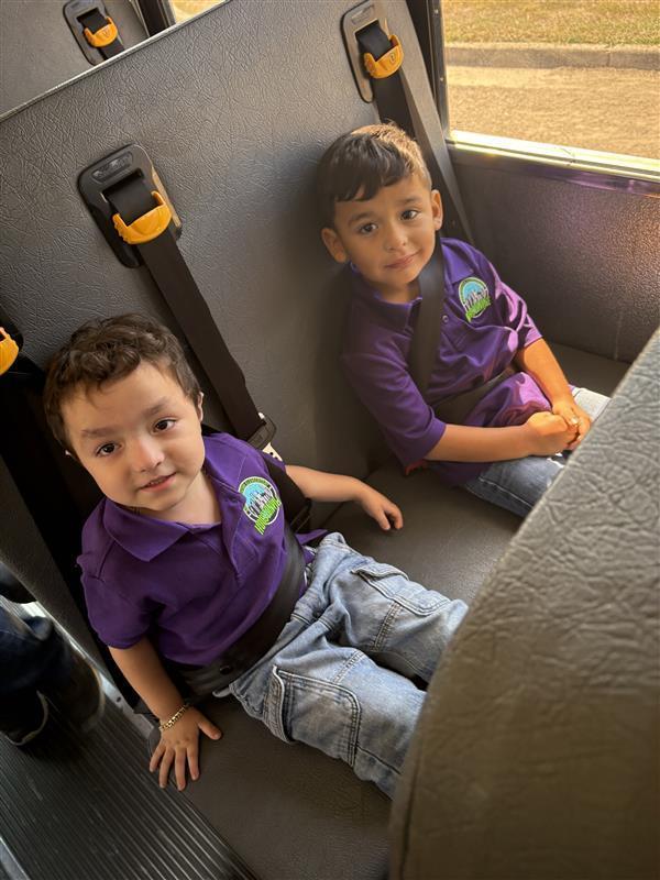 Kids posing during bus safety training.
