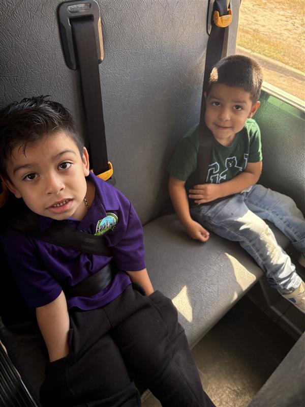 Kids posing during bus safety training.
