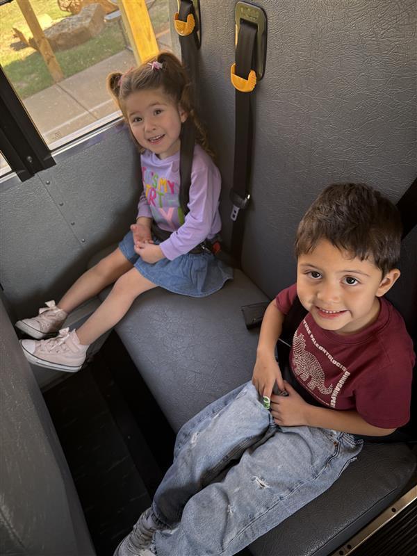 Kids posing during bus safety training.