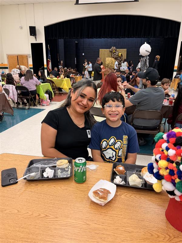 Family posing during Thanksgiving Family Lunch.