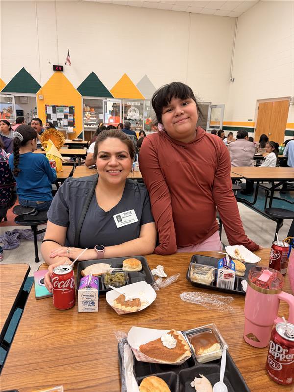Family posing during Thanksgiving Family Lunch.
