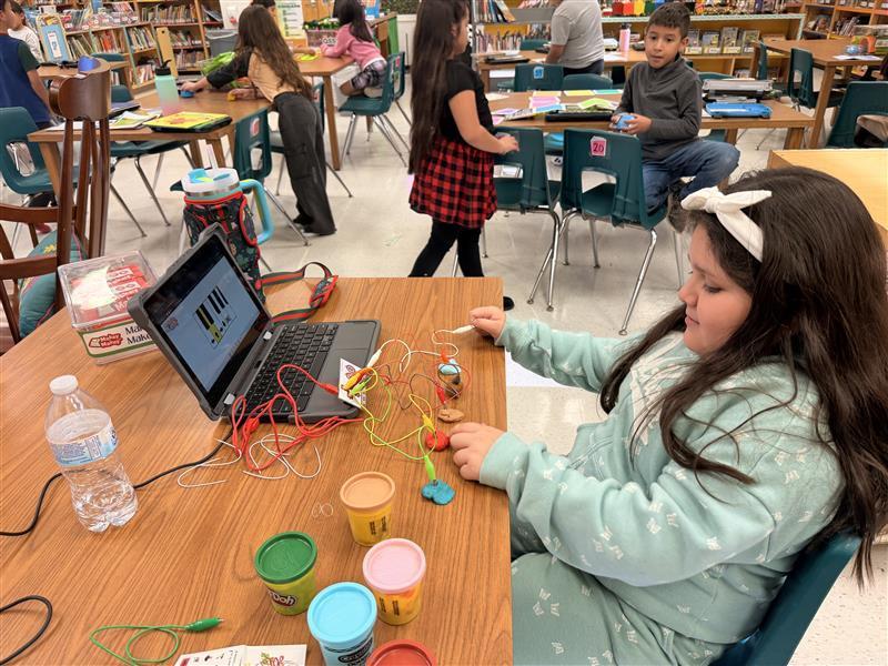 Kids working during their Hour of Code.