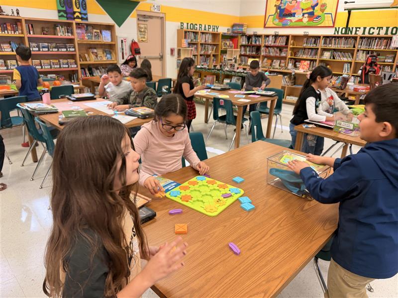 Kids working during their Hour of Code.