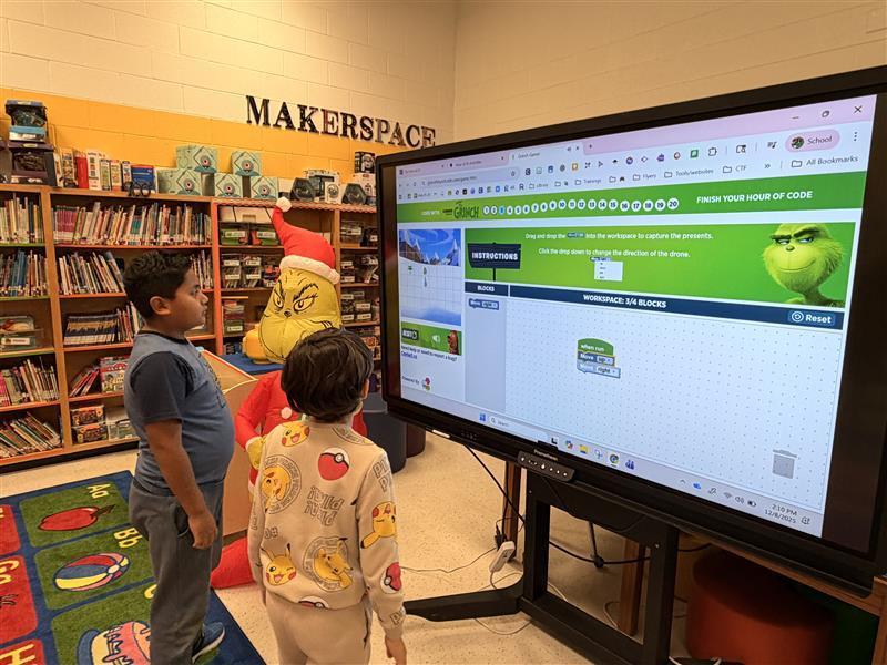 Kids working during their Hour of Code.