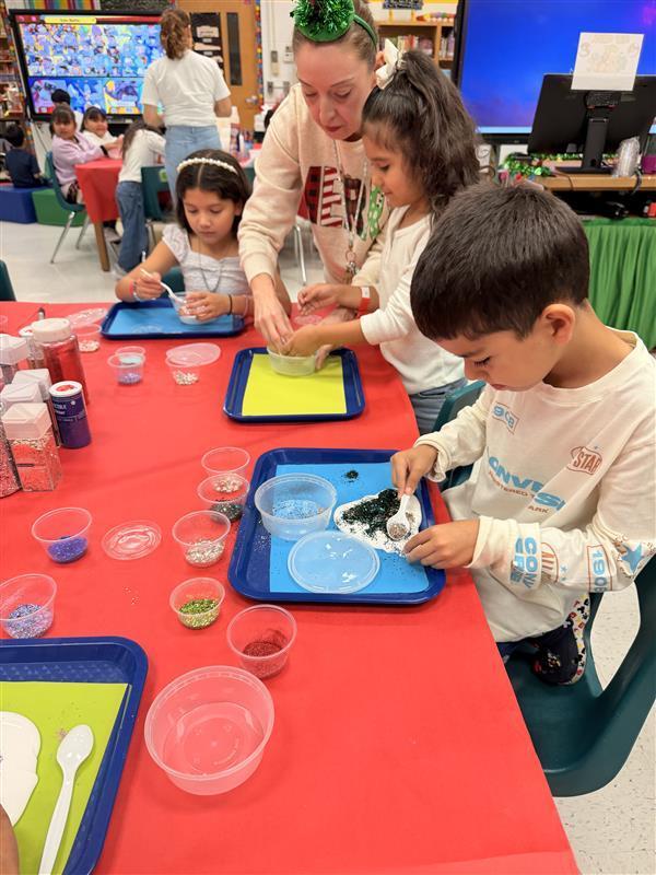 Kids working on activity at the library.