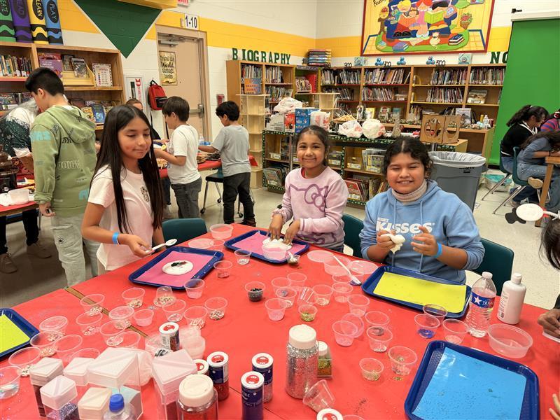 Kids posing  at the library.