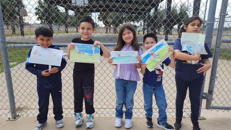 Kids posing with finished product.