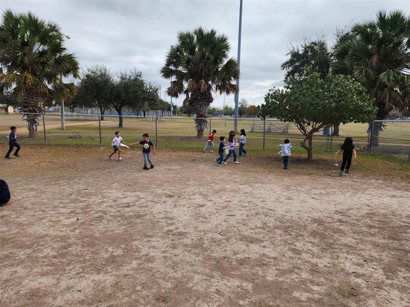 Kids running outside testing their products.