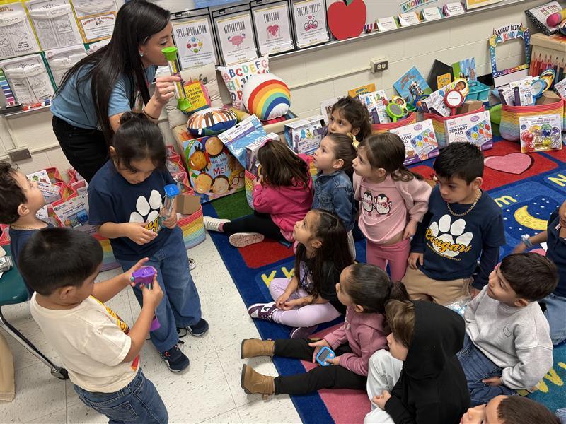 Kids listening to the counselor's lesson.