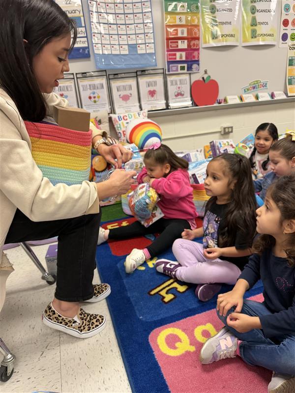 Kids listening to the counselor's lesson.