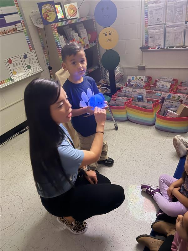 Kids listening to the counselor's lesson.