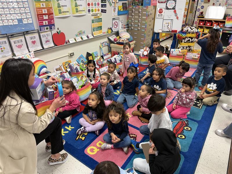 Kids listening to the counselor's lesson.