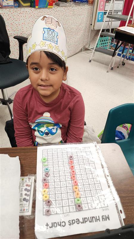 Kids posing while completing activity.