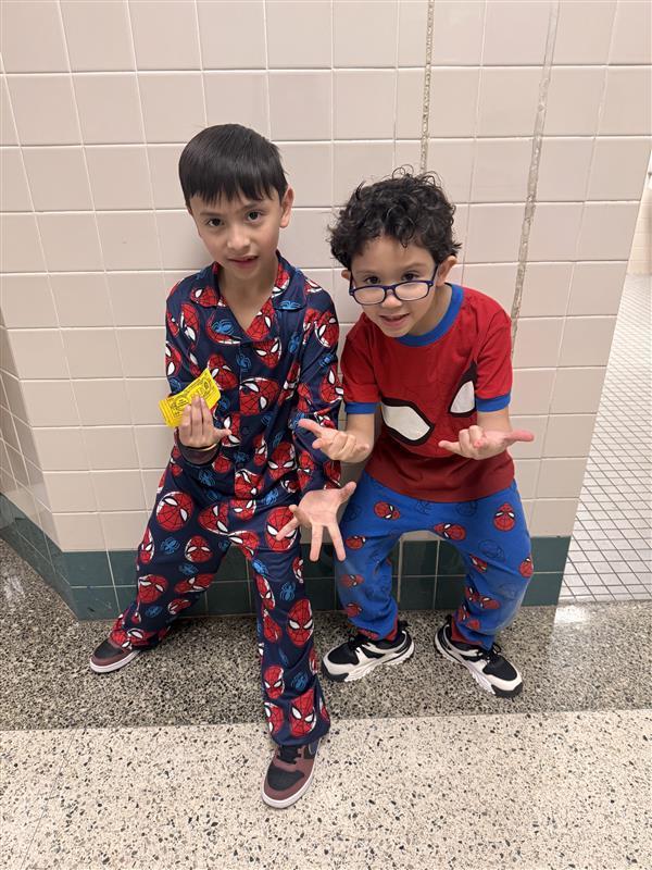 Kids posing with PJ's.