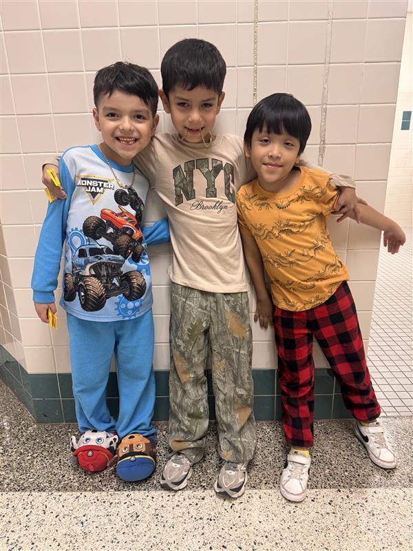 Kids posing with PJ's.