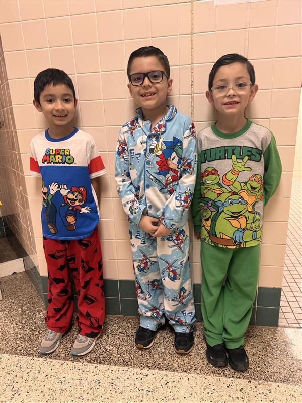 Kids posing with PJ's.