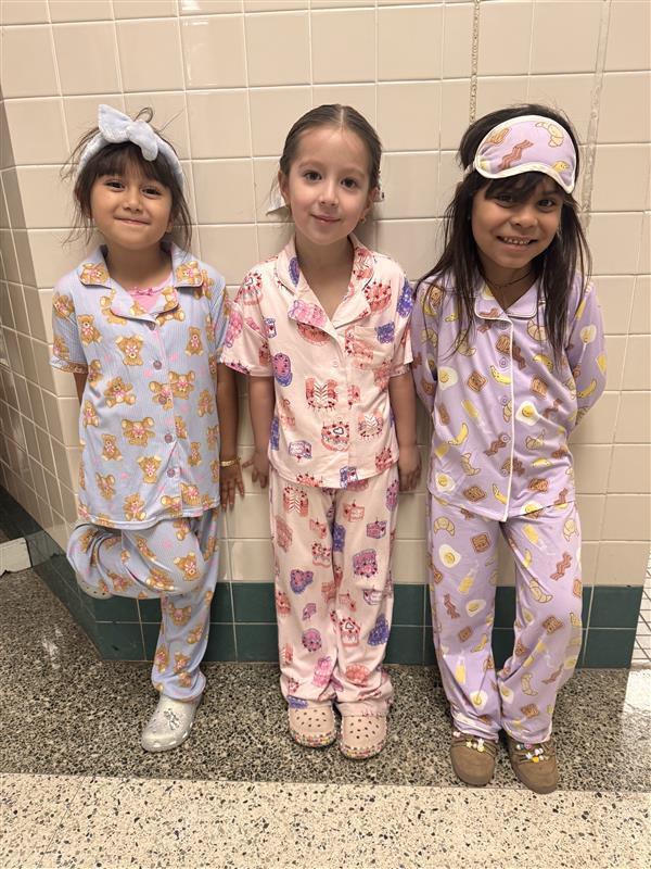 Kids posing with PJ's.