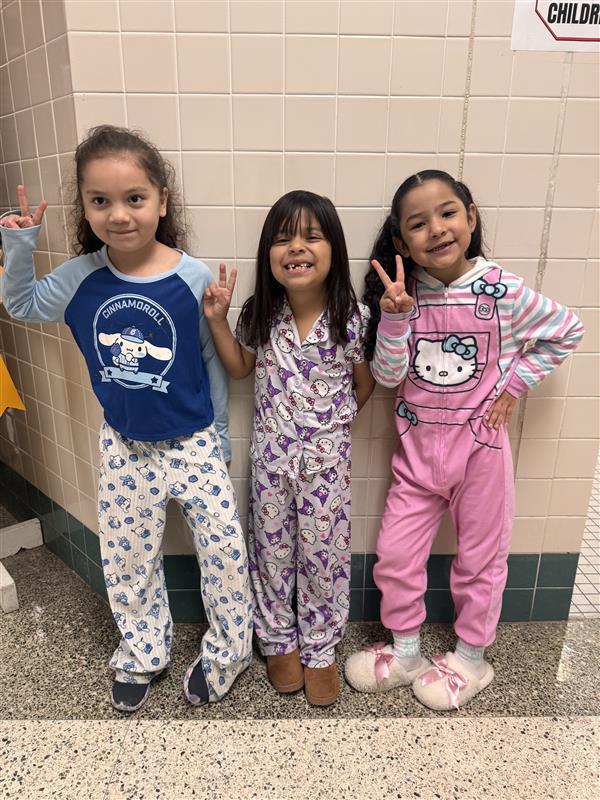 Kids posing with PJ's.