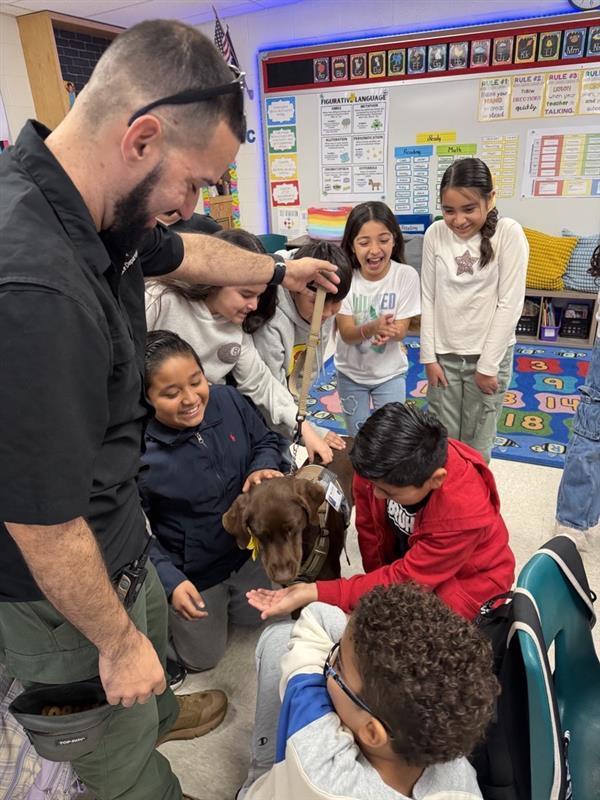 Students petting Penny.