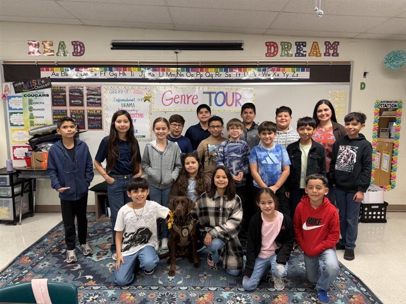 Students posing with Penny.